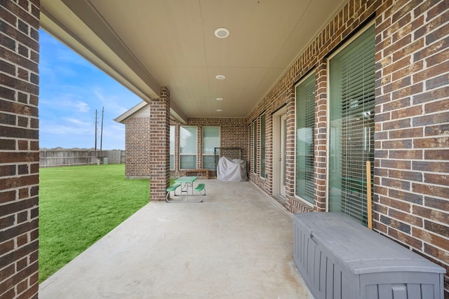 view of patio with fence