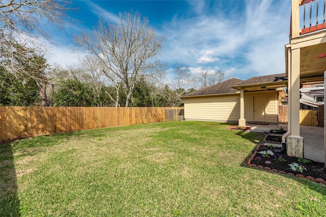 view of yard featuring fence private yard