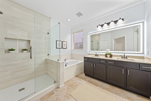 bathroom featuring a garden tub, double vanity, a sink, and a shower stall