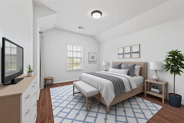 bedroom featuring lofted ceiling, baseboards, visible vents, and wood finished floors