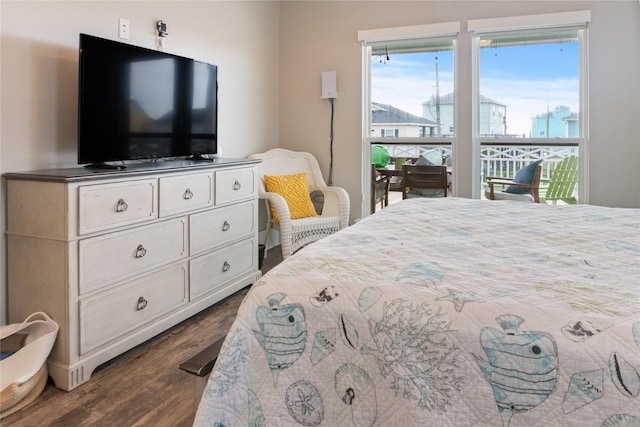 bedroom featuring dark wood-style floors