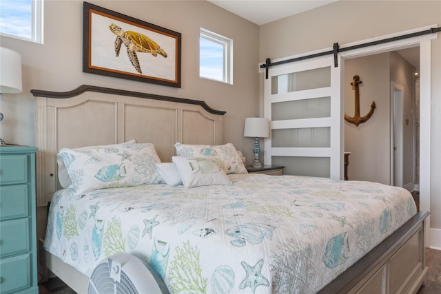 bedroom with a barn door