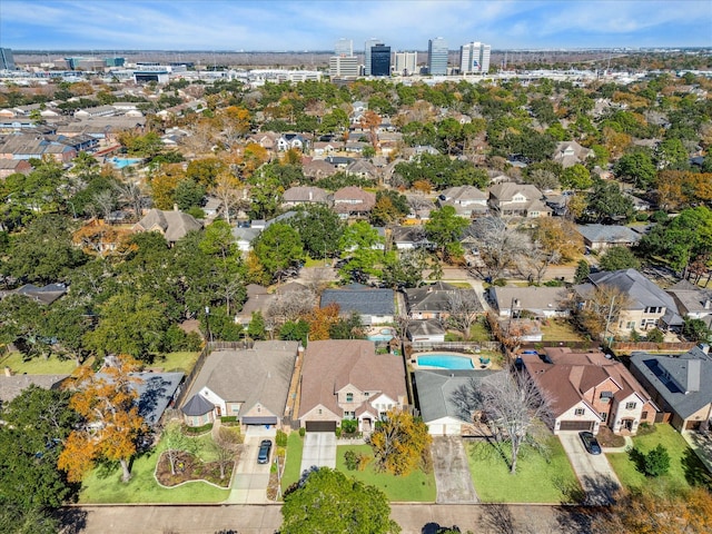 birds eye view of property with a residential view