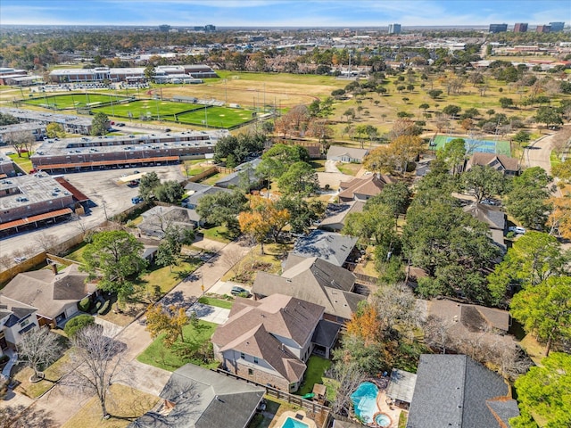 birds eye view of property with a residential view