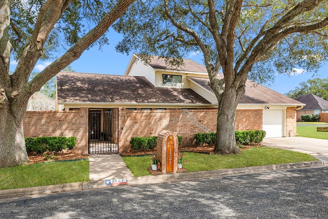 view of front facade featuring brick siding, a shingled roof, concrete driveway, an attached garage, and fence