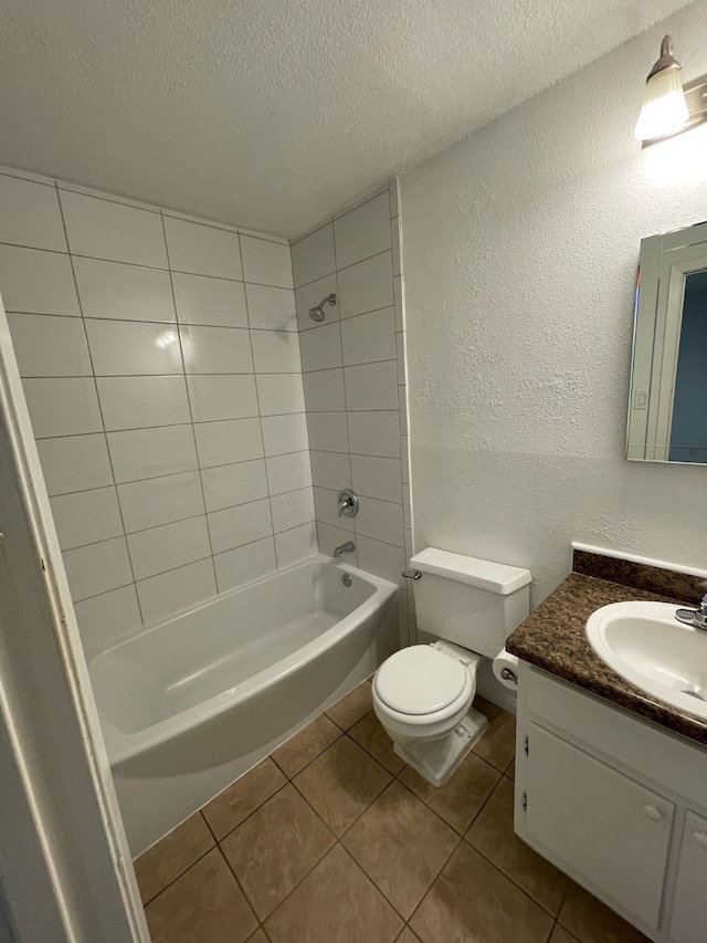 full bath featuring bathtub / shower combination, a textured wall, toilet, a textured ceiling, and tile patterned floors