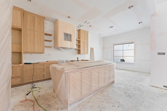 kitchen with light brown cabinets and open shelves