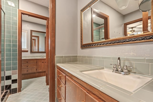 bathroom featuring backsplash and vanity