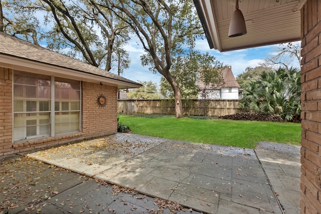 view of patio / terrace with fence