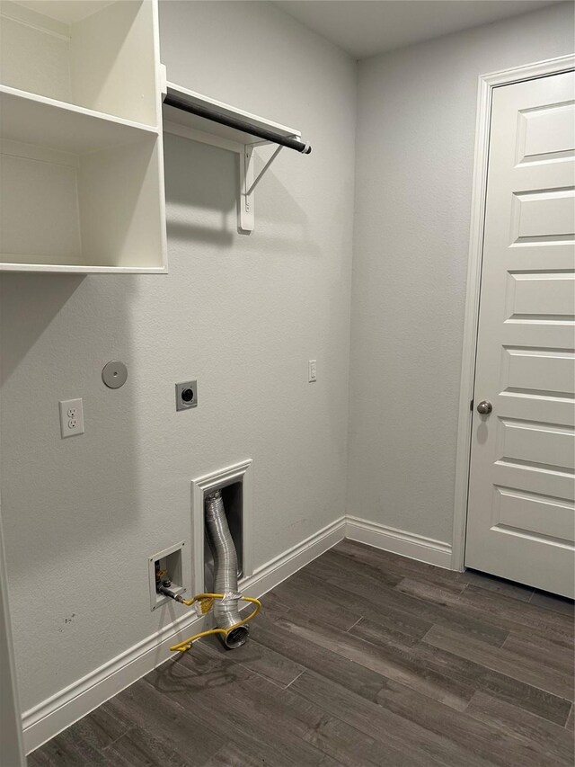 laundry area featuring dark wood-style floors, laundry area, baseboards, and hookup for an electric dryer