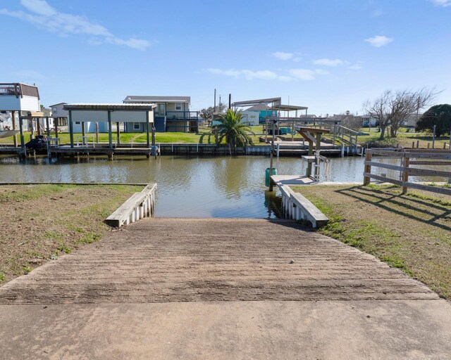 1821 County Road 201, Sargent, TX 77414 - dock area with a boat ramp and a water view