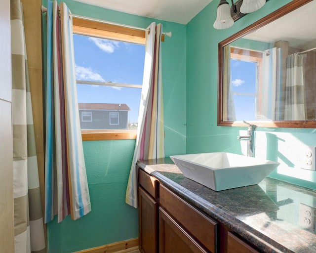 1821 County Road 201, Sargent, TX 77414 - bathroom with healthy amount of natural light and vanity