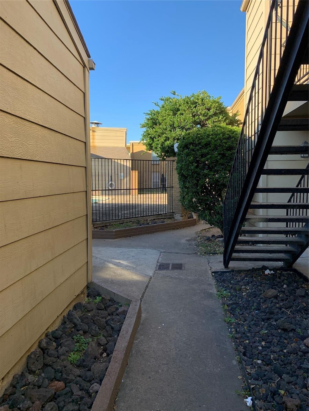 view of gate featuring fence