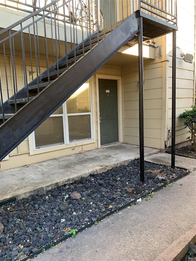 doorway to property featuring a balcony