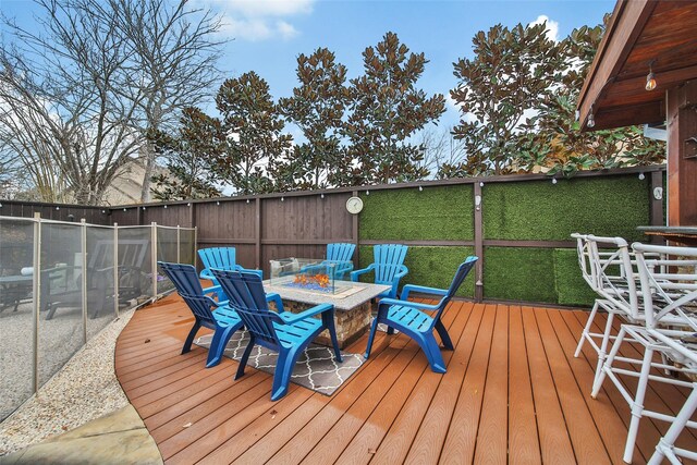 deck with a fire pit