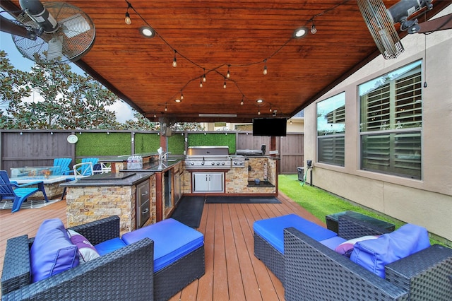 deck featuring fence and area for grilling