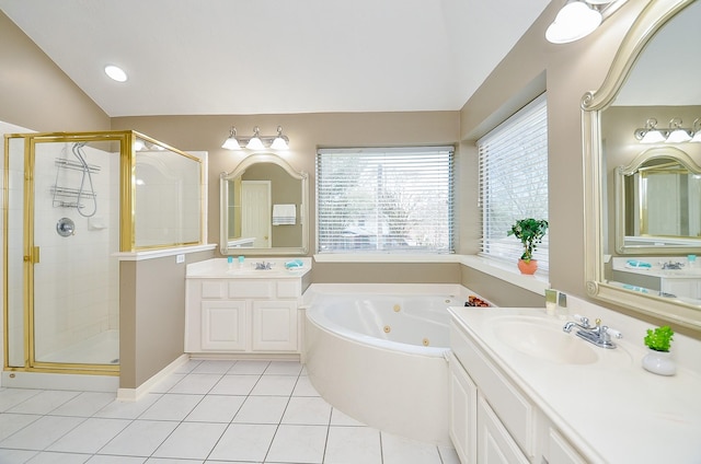 full bathroom with lofted ceiling, a stall shower, a sink, a tub with jets, and tile patterned floors