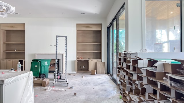 interior space featuring concrete floors