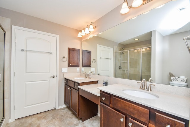 bathroom featuring visible vents, vanity, and a shower stall