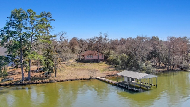 dock area featuring a water view and boat lift