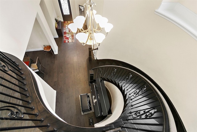 26407 Katy Springs Ln, Katy, TX 77494 - stairs with a notable chandelier, baseboards, and wood finished floors