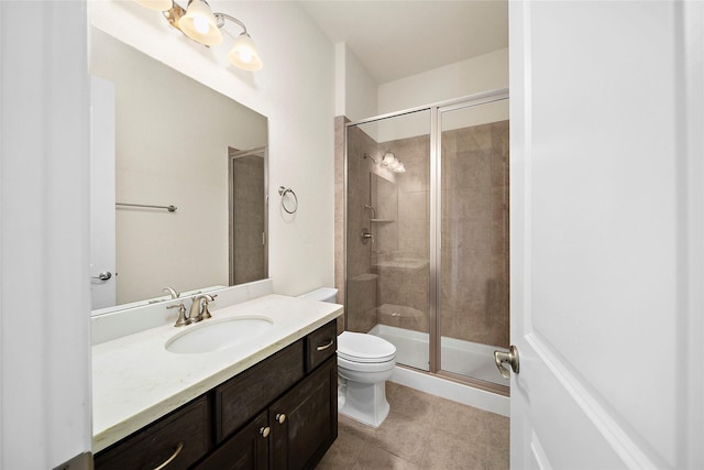26407 Katy Springs Ln, Katy, TX 77494 - bathroom featuring toilet, a stall shower, tile patterned flooring, and vanity