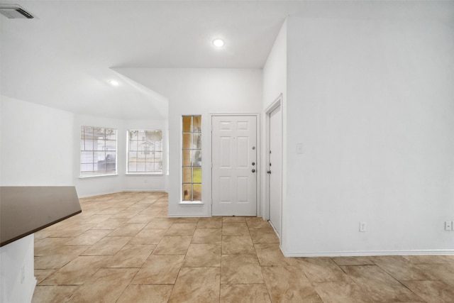 foyer with recessed lighting, visible vents, and baseboards