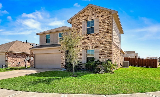 traditional home featuring a front yard, fence, driveway, a garage, and brick siding