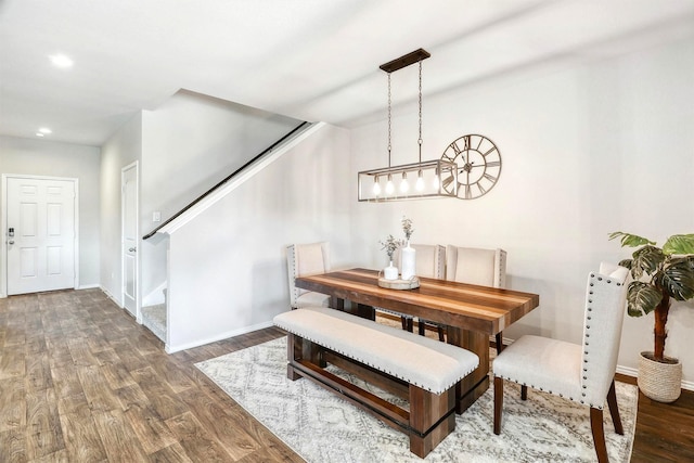 21023 Belmont Village Way, Katy, TX 77449 - dining space with wood finished floors, stairway, baseboards, and recessed lighting