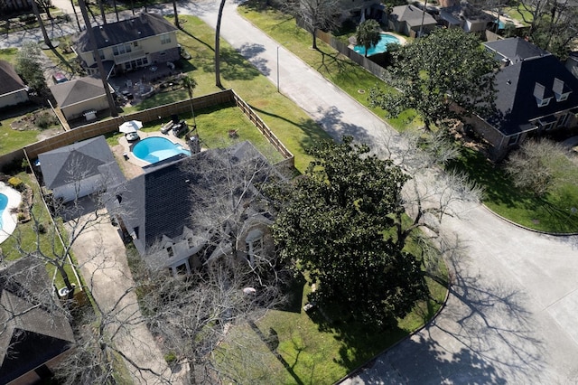 birds eye view of property with a residential view