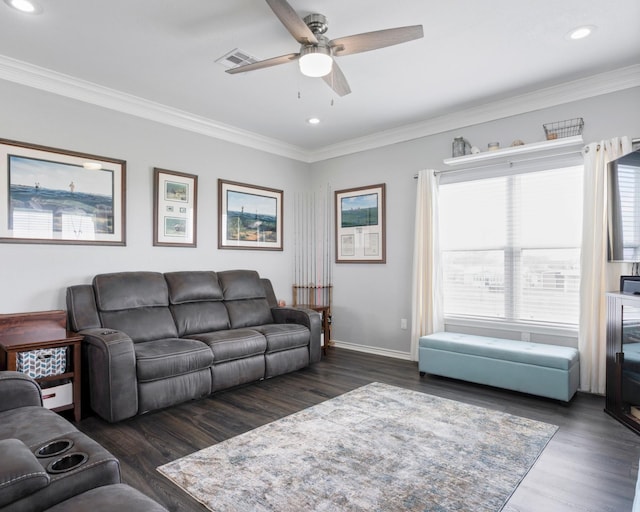 living area with recessed lighting, visible vents, crown molding, and wood finished floors