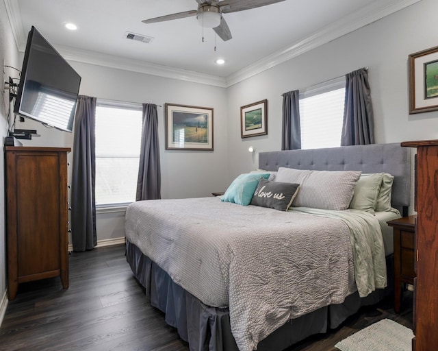 bedroom featuring visible vents, ornamental molding, dark wood finished floors, and recessed lighting