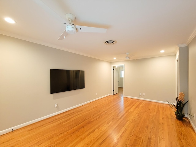 unfurnished living room with baseboards, visible vents, a ceiling fan, light wood-style flooring, and crown molding