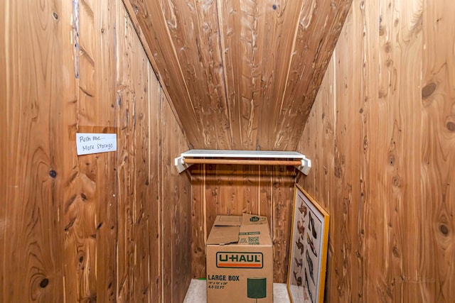 interior details featuring wood walls and a sauna