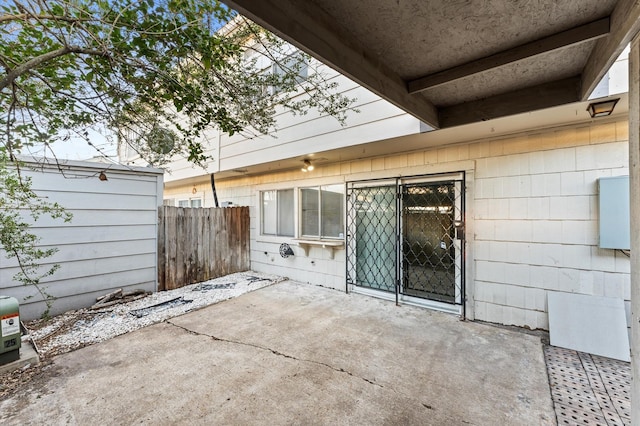 view of patio featuring fence