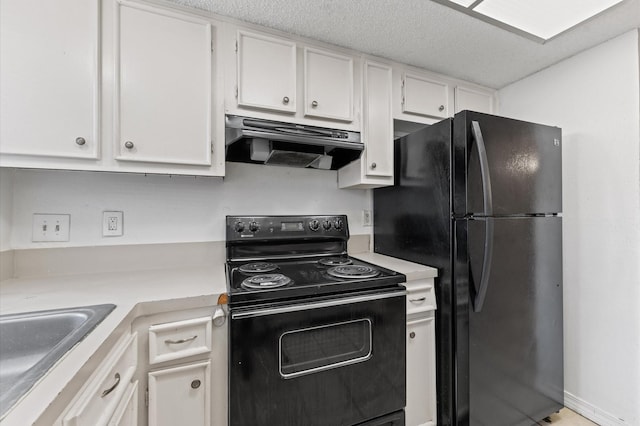 kitchen with under cabinet range hood, a sink, white cabinets, light countertops, and black appliances