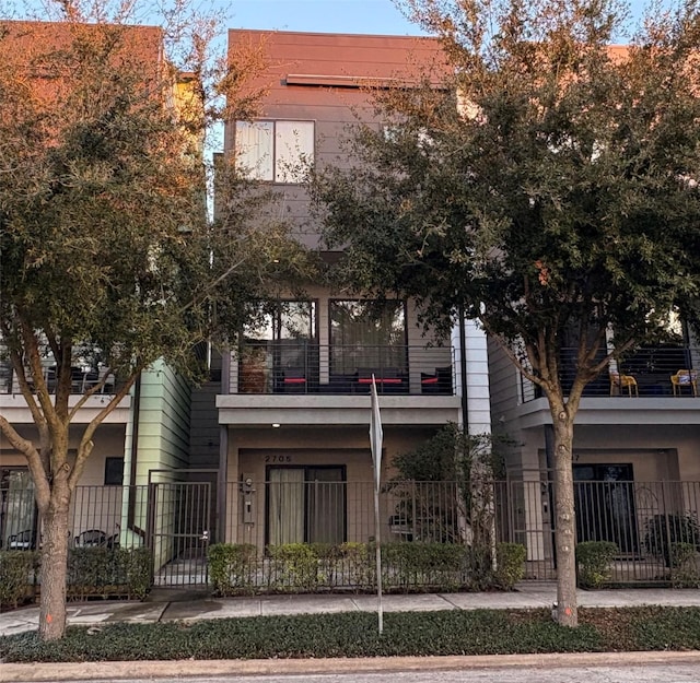 view of property with a fenced front yard