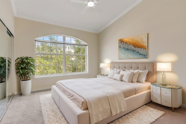 carpeted bedroom with crown molding, multiple windows, and vaulted ceiling