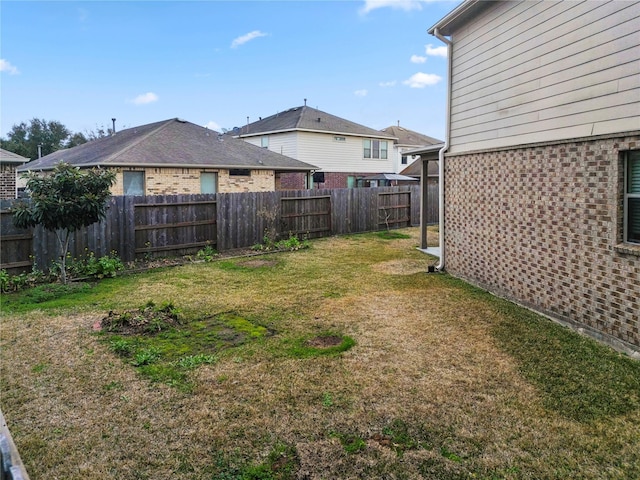 view of yard featuring a fenced backyard