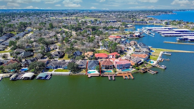 aerial view with a water view and a residential view