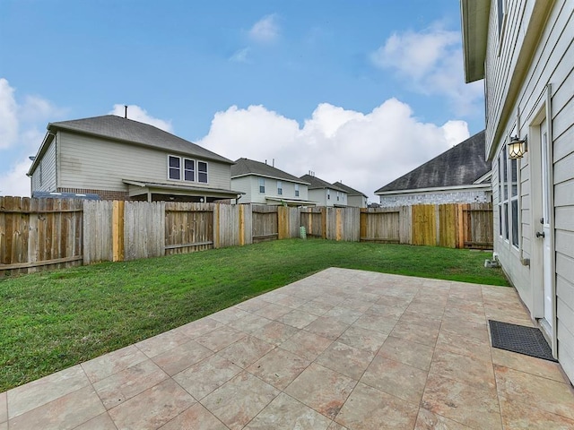 exterior space with a fenced backyard