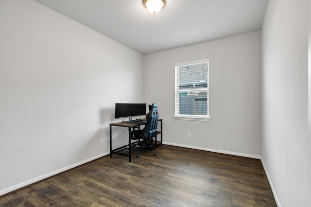 office space featuring wood finished floors and baseboards