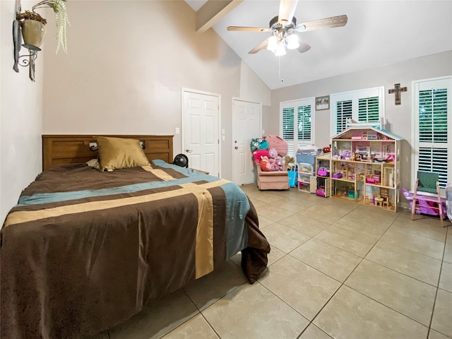 bedroom with ceiling fan, multiple windows, beamed ceiling, and tile patterned flooring