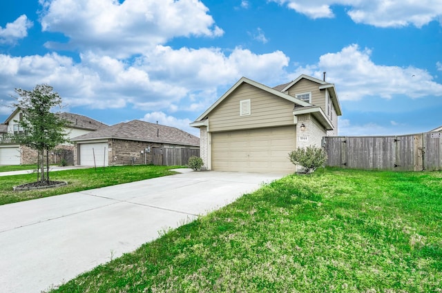 view of front of house with fence, a front lawn, concrete driveway, and brick siding