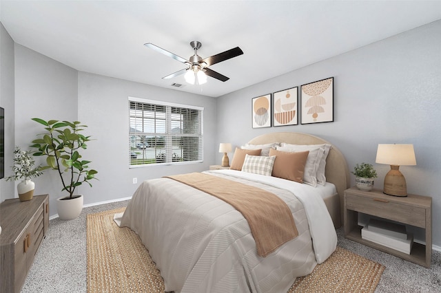 bedroom featuring visible vents, a ceiling fan, and baseboards