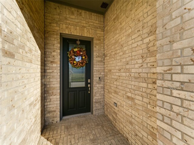 entrance to property with visible vents