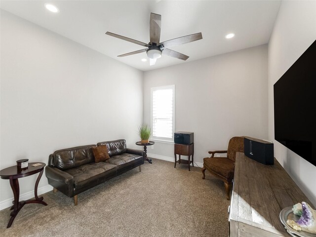 carpeted living room with recessed lighting, ceiling fan, and baseboards