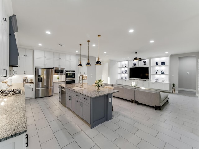 kitchen with white cabinets, visible vents, stainless steel appliances, and recessed lighting