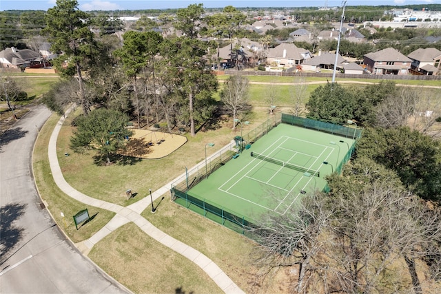 birds eye view of property with a residential view