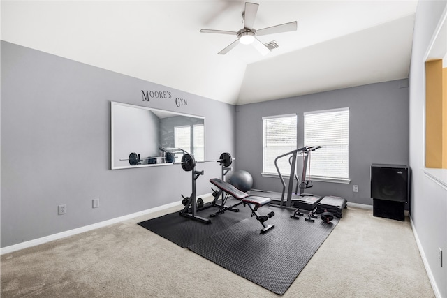 exercise room with visible vents, baseboards, a ceiling fan, carpet, and vaulted ceiling